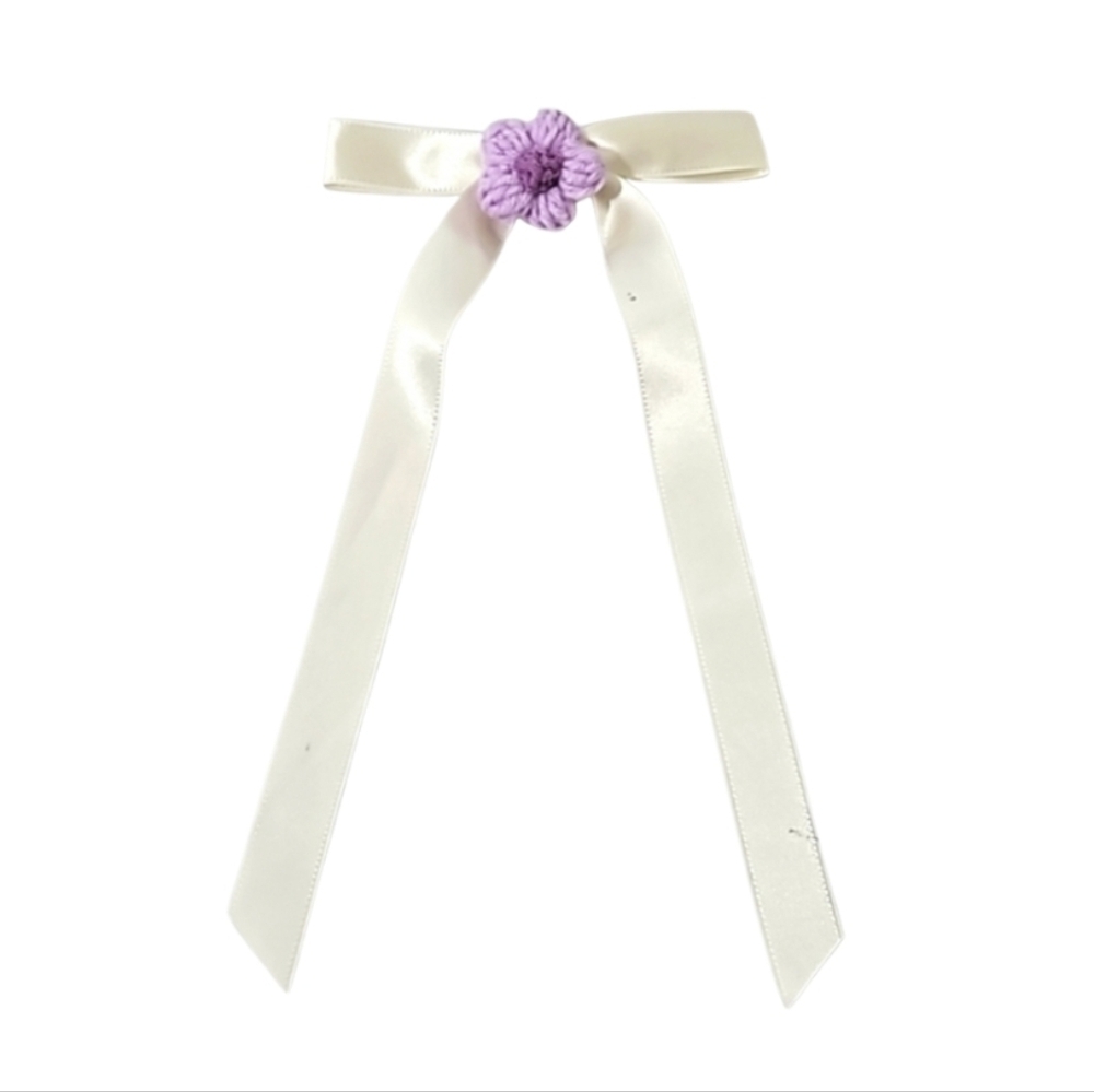 Hand Crafted Ivory Bow with Purple Crochet Flower